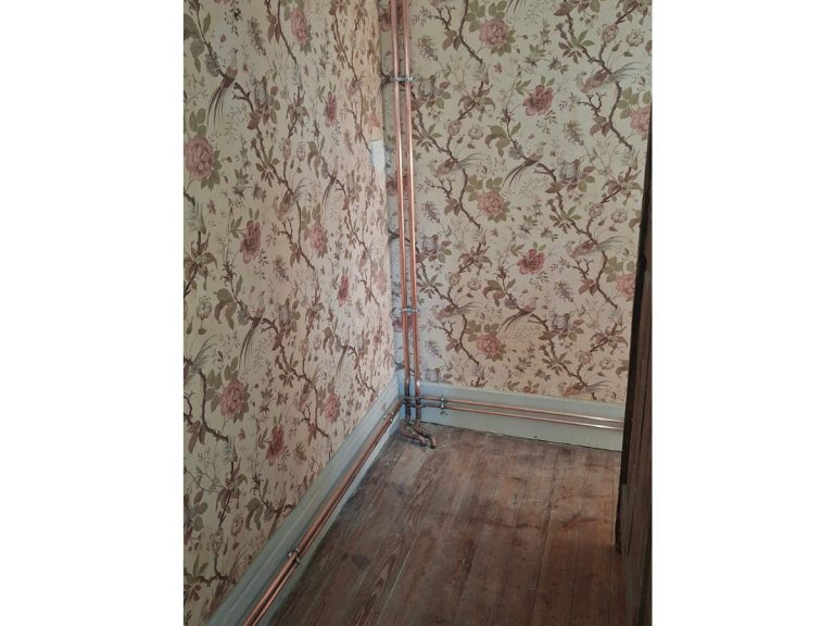 Rénovation d'un chauffage central dans un manoir classé patrimoine